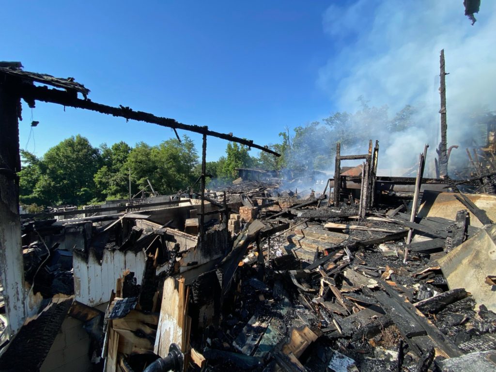 Damage from dining hall fire at Camp Airy