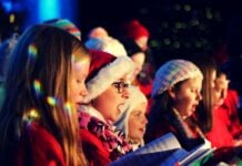 Santa Sightings in Frederick County Children singing in festive outfits
