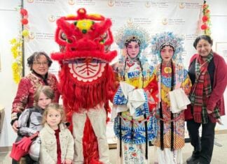 9 FREE Events Coming Up in Frederick People in Chinese traditional dress standing, including a person in a lion dancing costume
