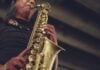 A man playing a saxophone