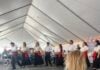 A girl watches dancers at the Frederick Greek Festival