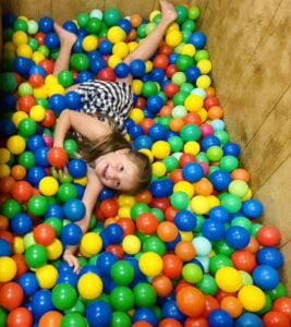 Child in a ball pit 