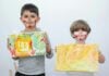 Weekend Fun in Frederick: March 6-8 Two children holding up paintings, their faces are covered in red paint