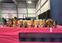 Mommy and Me Classes in Frederick Gymnastics students lined up on a mat