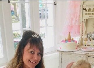 A mother and daughter at a fancy table