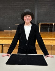 Kid dressed as a magician