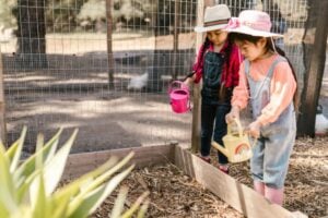 Two girls gardening