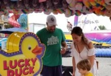6 Things for Families To Know in Frederick: August & September Kids gather round a duck game at the Maryland State Fair.