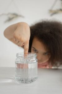 Girl with a jar of slime