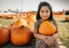 Fall Festival Fun in Frederick Girl holding pumpkin